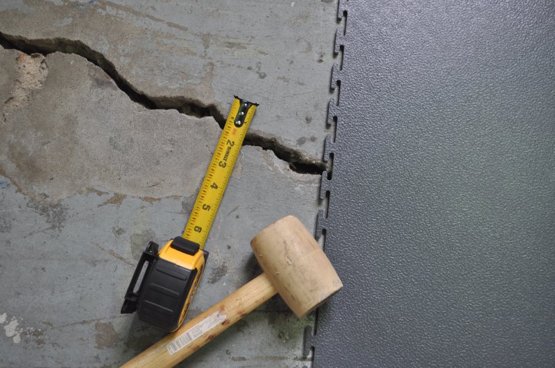 Perfection Floor Tile, cover cracked stained concrete.